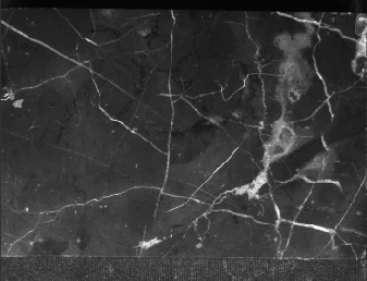 White arc bar: the pattern remains more visible across the captured field.
