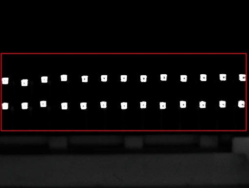Source pin-light capture: bright tip regions are more isolated from the background; original red box retained.