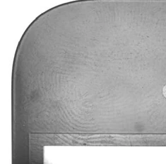 Crop of the real right-angle coaxial capture, retaining the curved outer edge; unrelated printed part identifiers are outside the crop.