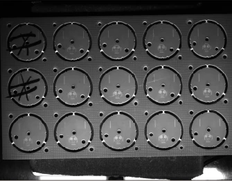 Round board panel under the straight bar; note the dimmer edge regions.