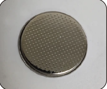 Textured metal disc shown in the source sheet.